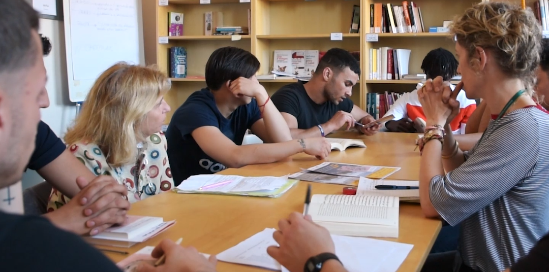 libri e voci in biblioteca